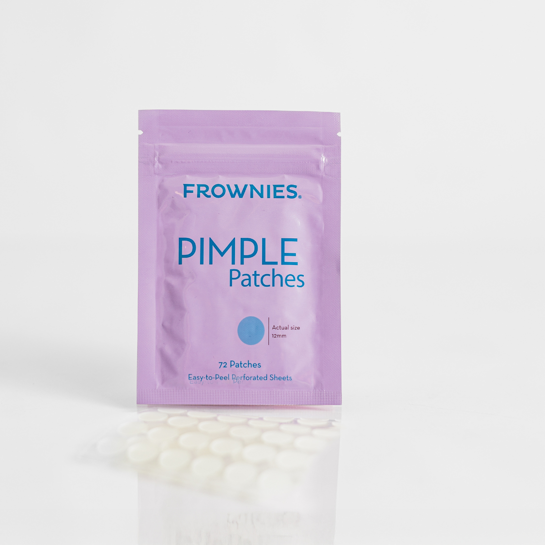 Purple package of Frownies Pimple Patches for acne breakouts