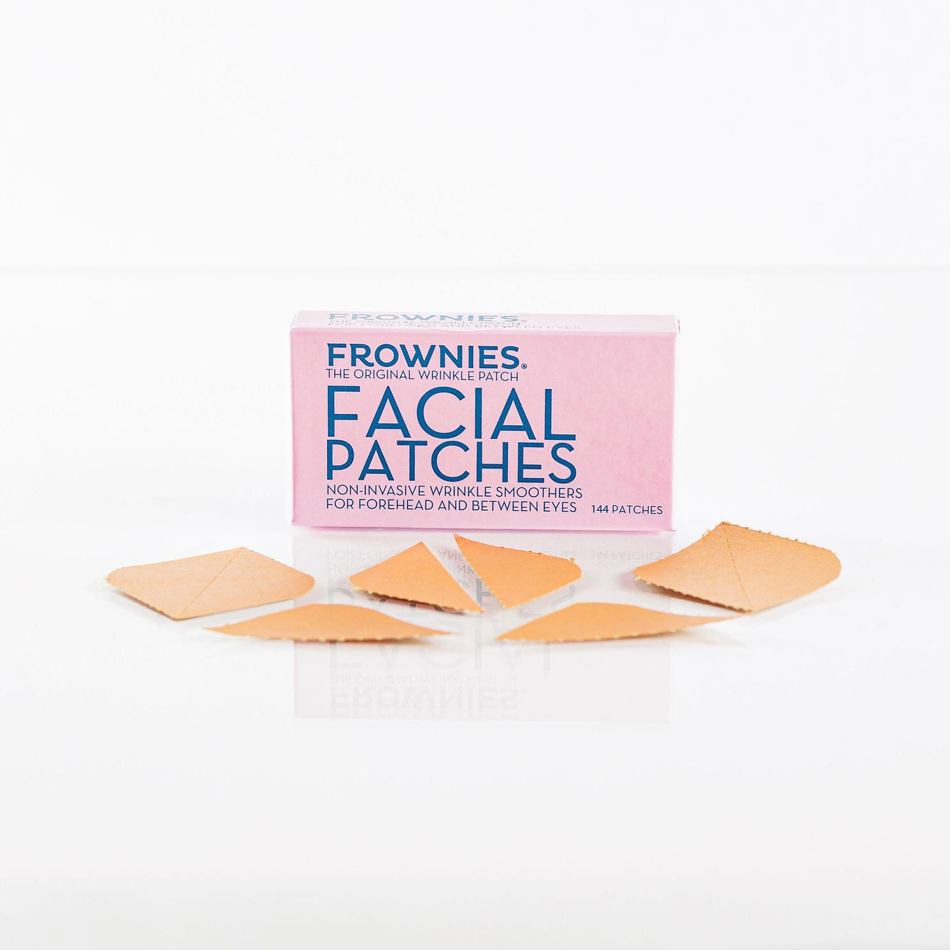 Frownies FBE facial patches pictured on a clean white background with the patches laid out in front 