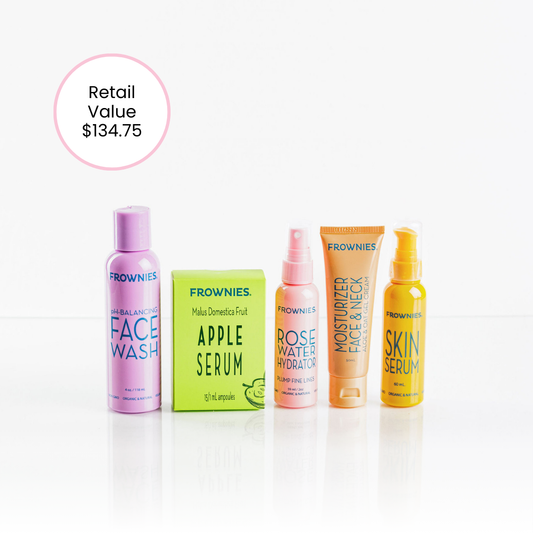 Group of Frownies products - face wash, apple serum, rose water hydrator, moisturizer for face and neck, and skin serum. Bundles is called Frownies Skincare Basics. Image includes retail value sticker of $134.75. Bundle is available for a discounted rate below retail value. 