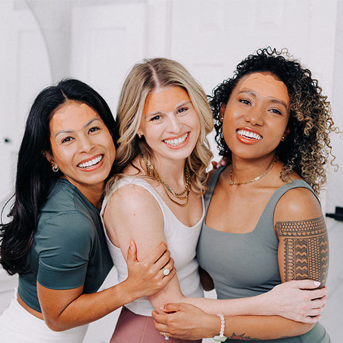 group of woman wearing frownies forehead patches