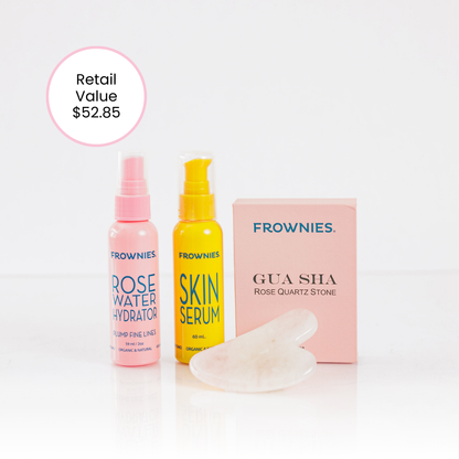 Frownies gua sha rose quartz stone next to Frownies Rose water hydrator spray and skin serum. This is the Gua Sha Bundle. Image shows the retail value of $52.85 showcasing the discount value of purchasing as a bundle. 