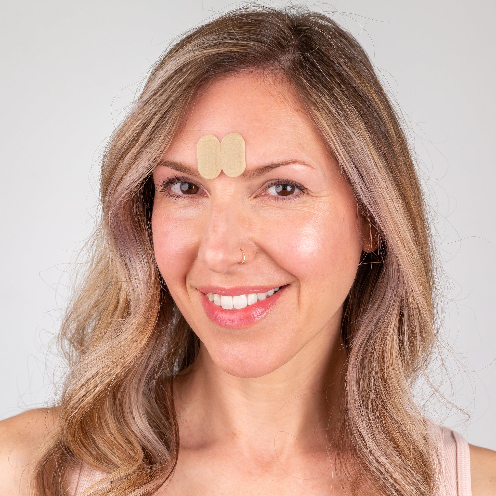 woman wearing Gentle Lifts between the eyebrows for 11 lines