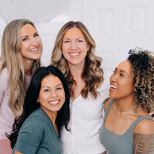 Group of Woman wearing Frownies laughing and smiling