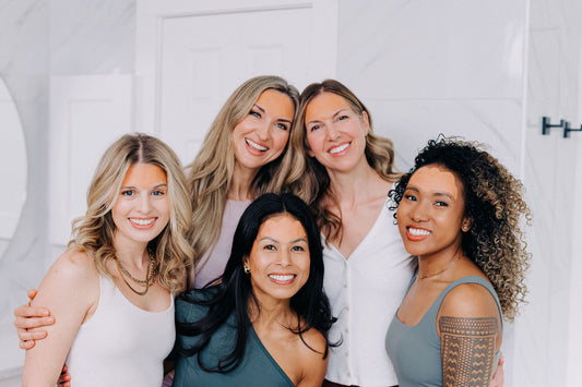 group of 5 women wearing forehead wrinkle patches